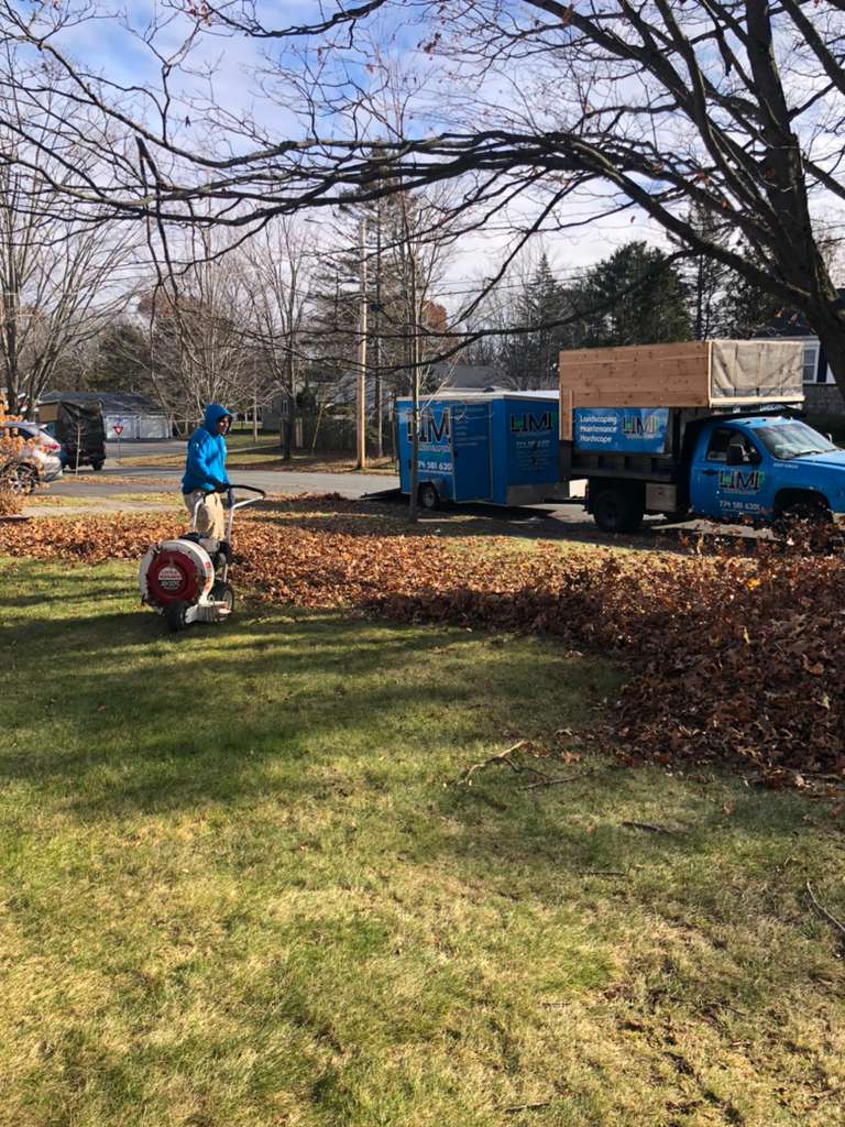 Limi Landscaping crew working on a residential property